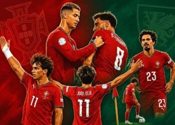 João Félix celebrates with Portugal teammates after scoring against Wales at Estádio José Alvalade.